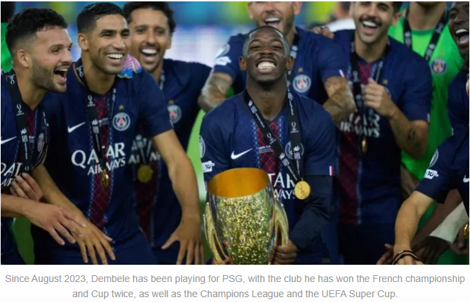 A group of joyful PSG players, including Ousmane Dembélé, celebrating with a trophy after a recent match.